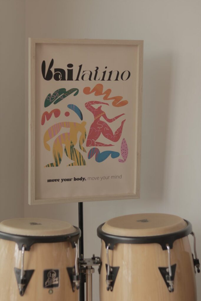 The Vailatino poster above a pair of congas