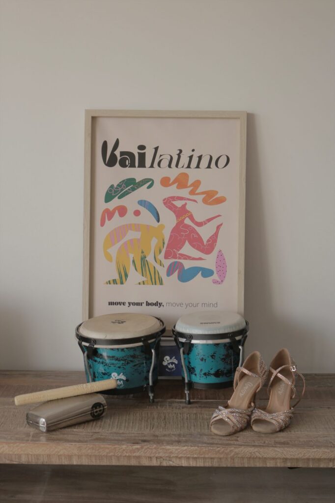 Dance shoes and bongos beneath the Vailatino poster